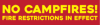 Bright reflective red background rectangle, 24 inches wide and 6 inches tall NO CAMPFIRES in all caps, bright reflective yellow sans serif font, Stacked underneath, and slightly smaller, is FIRE RESTRICTIONS IN EFFECT in all caps, bright reflective yellow sans serif font.Bright reflective red background rectangle, 24 inches wide and 6 inches tall NO CAMPFIRES in all caps, bright reflective yellow sans serif font, Stacked underneath, and slightly smaller, is FIRE RESTRICTIONS IN EFFECT in all caps, yellow