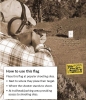 Man shooting with flag in ground next to him