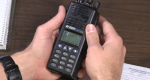 Image of a Bendix-King KNG radio being manually programmed.