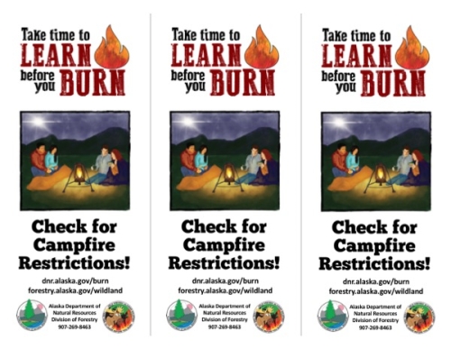 Alaksa Learn Before You Burn Rack card with campers by a lantern light